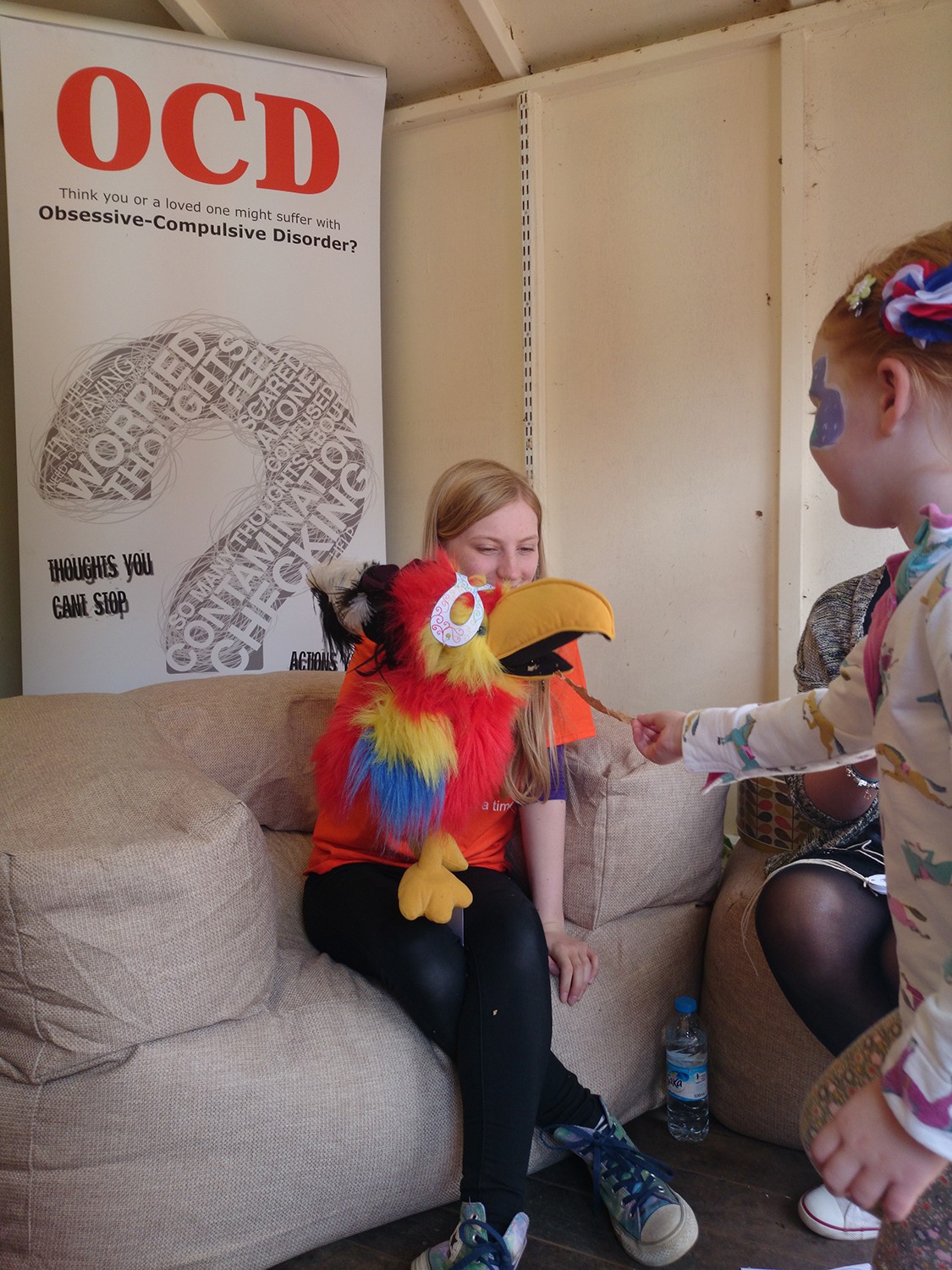 An OCD-UK volunteer working with a young person during an OCD awareness campaign in the East Midlands.